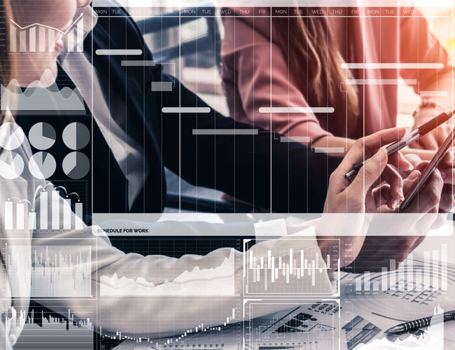 Womans hand pointing at gantt chart